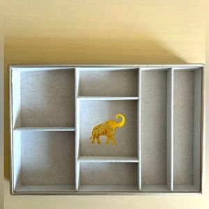 Metallic Felt tray with multiple compartments & a golden elephant in the center